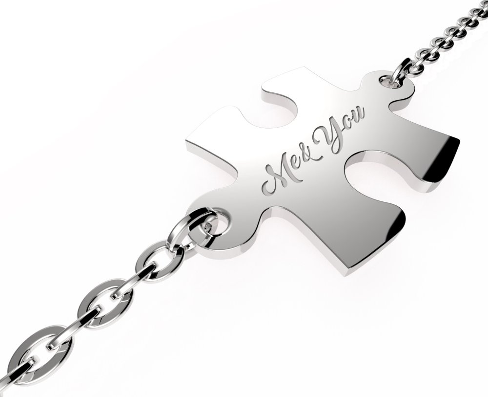 Ezüst karkötő puzzle alakú gravírozott medállal