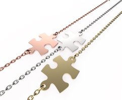 Arany karkötő puzzle alakú medállal