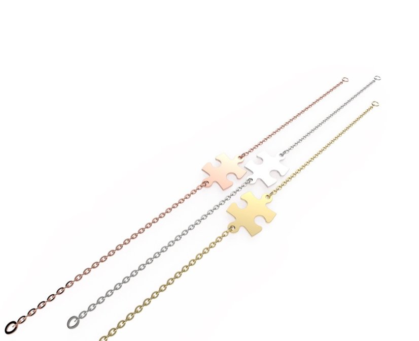 Zlatý náramok s puzzle